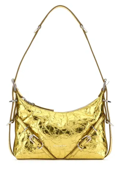 Givenchy Handbags. In Golden